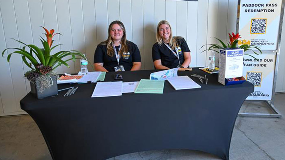 Members of the College Program work the Borchetta Bourbon Music City Grand Prix