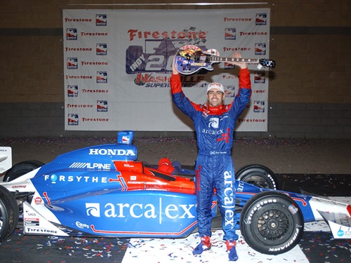 Dario Franchitti celebrates winning in Nashville.