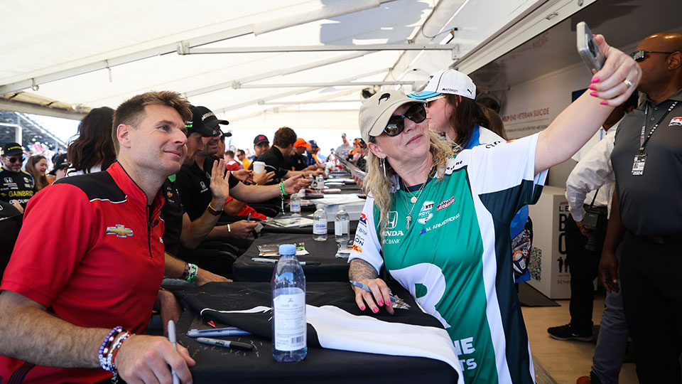 A fan takes a selfie with WIll Power