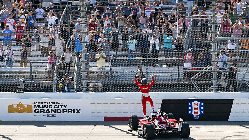 Josef Newgarden Celebrates after winning the Borchetta Bourbon Music City Grand Prix