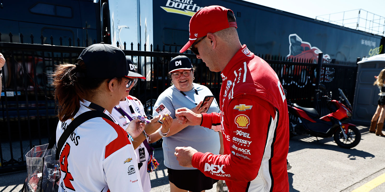 Scott McLaughlin signs autographs
